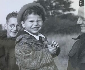 Photograph of Jackie Young at Crosby-on-Eden airfield in August 1945.