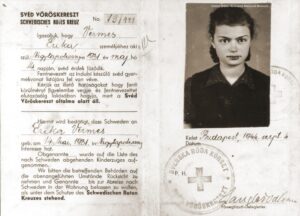 Photograph of the protective document issued to Erika Vermes by the Swedish Red Cross in September 1944 in Budapest, Hungary. The document states that Erika's name appears on the passenger list of a Swedish children's transport that is about to leave Hungary and appeals to the authorities to let her remain at her current residence until the time of her departure.