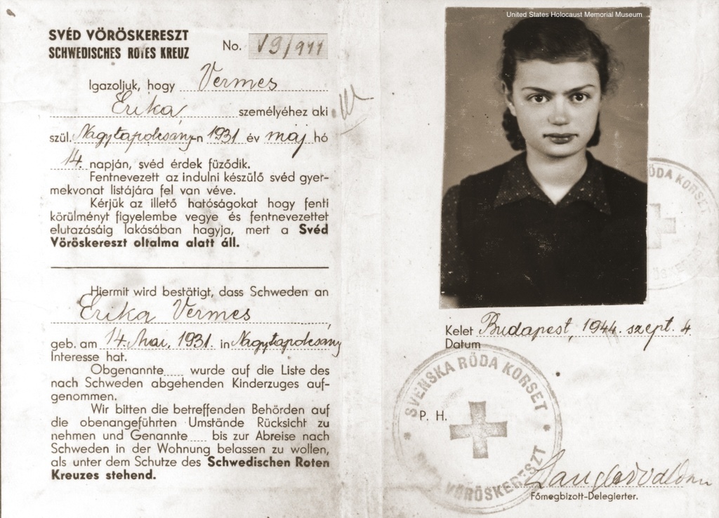 Photograph of the protective document issued to Erika Vermes by the Swedish Red Cross in September 1944 in Budapest, Hungary. The document states that Erika's name appears on the passenger list of a Swedish children's transport that is about to leave Hungary and appeals to the authorities to let her remain at her current residence until the time of her departure.