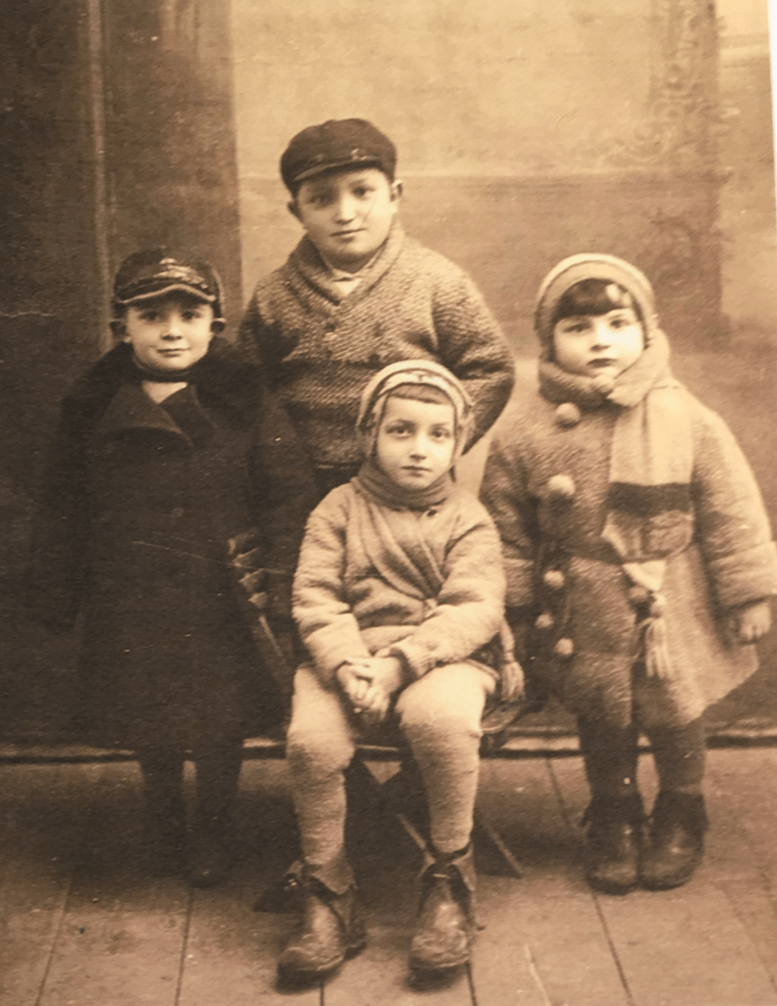 Photograph of Sidney Baker, centre, with his three brothers.