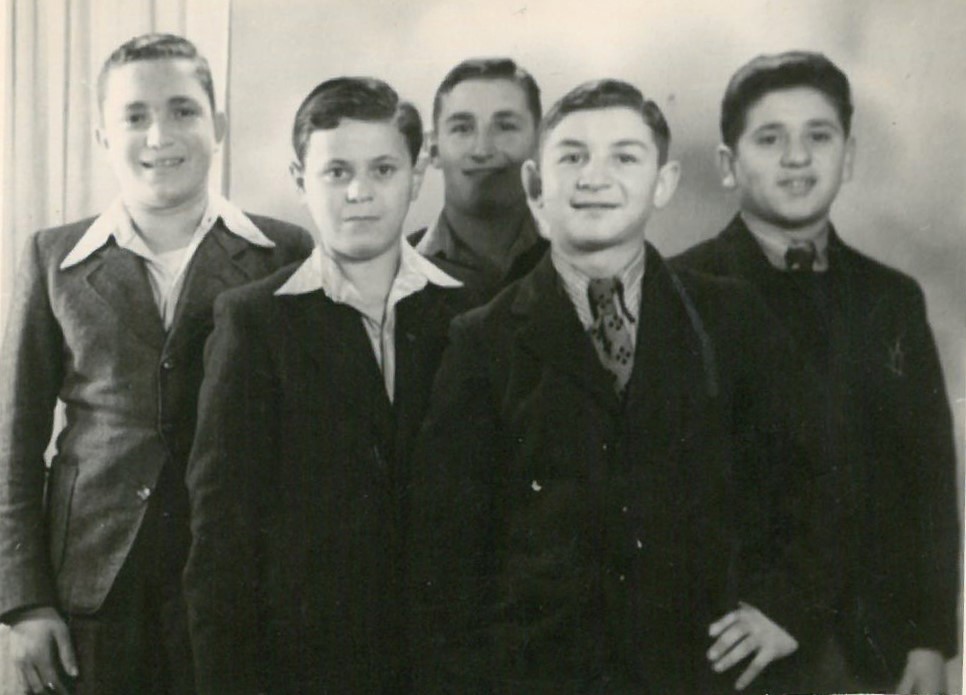 Photograph of (L-R) Sid Baker, unknown, Harry Wajchandler, Howard Chandler, anf Arek Hersh.