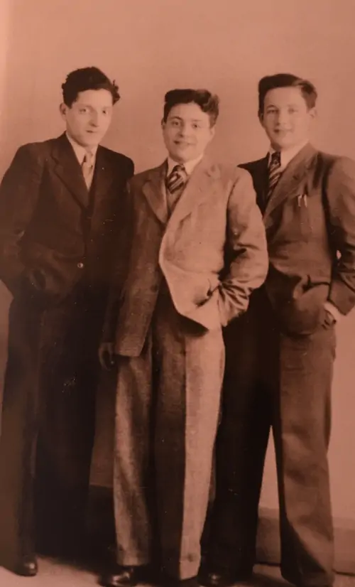 Photograph of (left to Right) Manfred Heymann, Jacob Fersztand and Nathan Rolnik in Garnethill hostel, Glasgow, 1946.