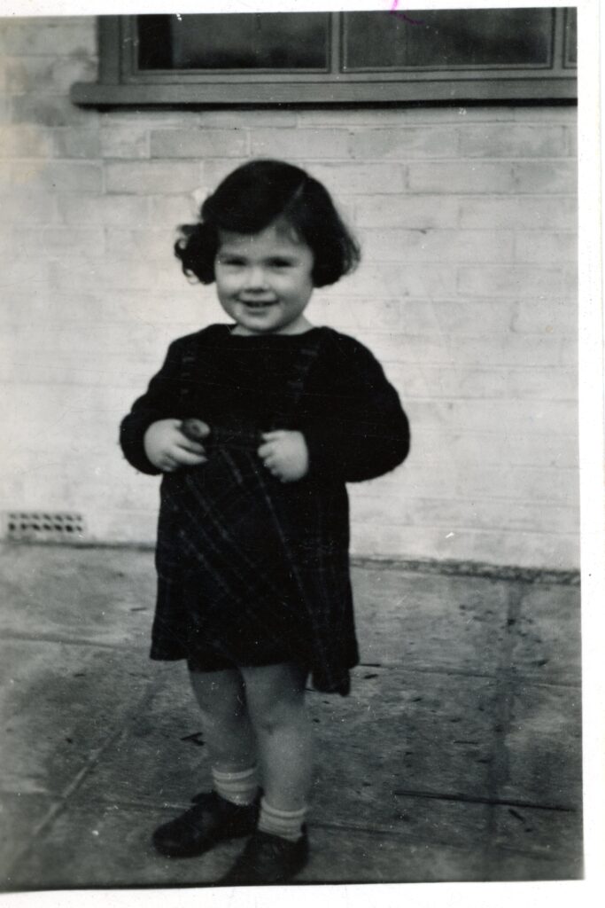 Photograph of Bella Rosenthal in Bulldogs Bank 1945-46.
