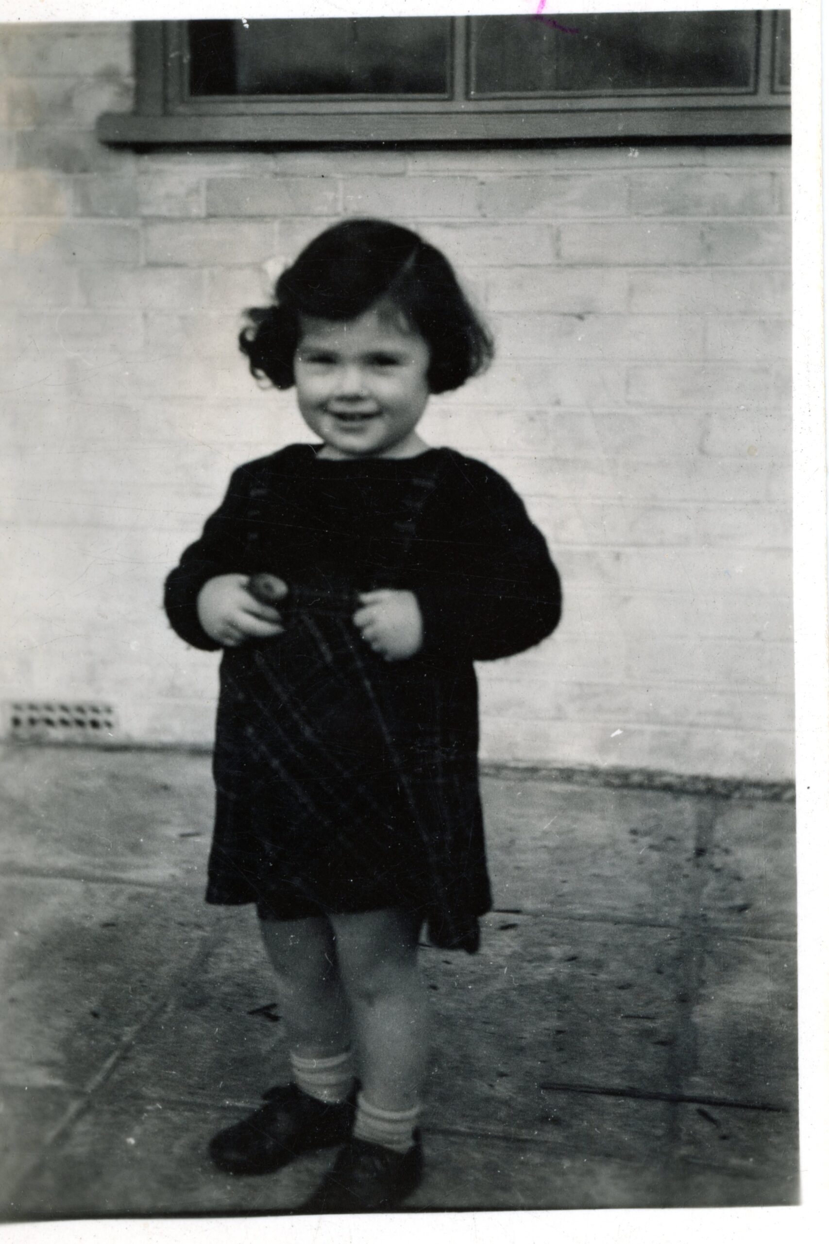 Photograph of Bella Rosenthal in Bulldogs Bank 1945-46.