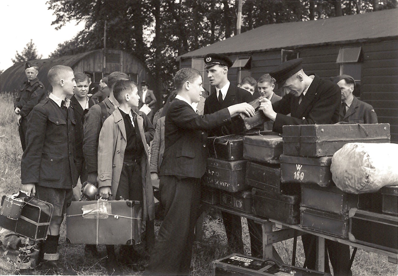 Photograph of Monty Graham, far left, about to set off for the UK from Prague, August 1945