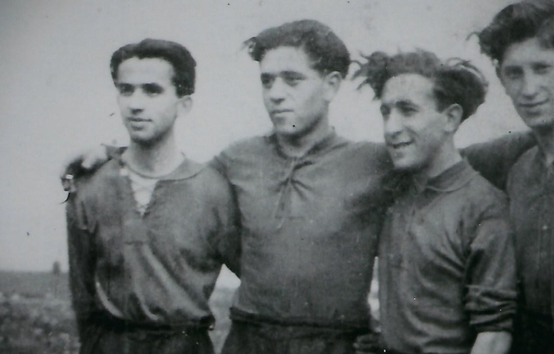 Photograph of Arek Hersh, centre, right.